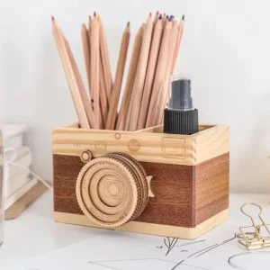 Porta-lápis em formato de câmera